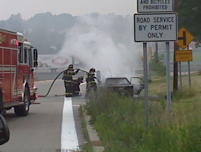 Nanuet FD members battle early morning car fire. NYS Thruway, 6/22/08