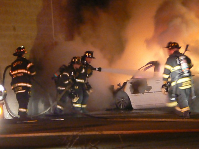 NFD members fight late night car fire. 4/8/08 Photo:  Lance Thaxton, Dept 17