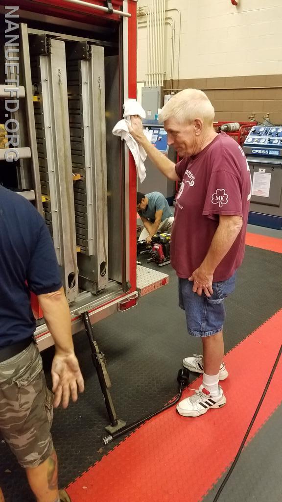 Tonight members of the Fire Department are getting the trucks ready to pay our last respect to Bob Lacy. We will miss you Bob.
Photos by Vincent P Tuzzolino 10/11/2021
 