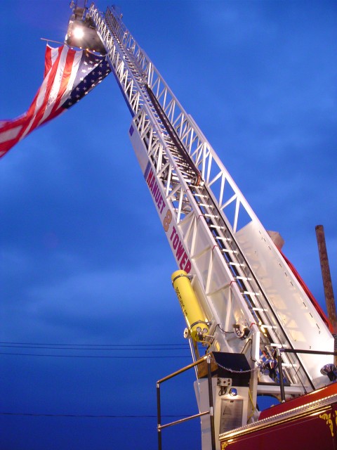 8-Tower displays the American Flag at the fundraising carnival.  9/25/03