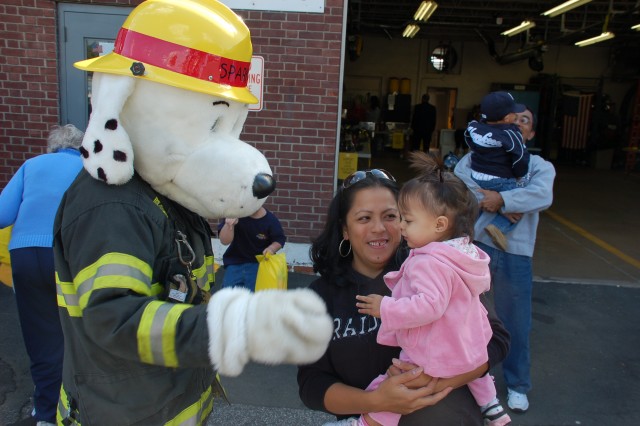 Sparky the fire dog visits the children at the NFD open house, 10/11/09.  Photo:  Tommy Bierds