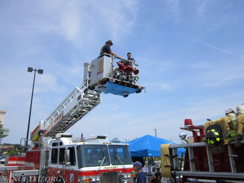 2015 BBQ Contest. Fairway in Nanuet. 
Photo By Vincent P. Tuzzolino Raising the Flag. 8 Tower and 24 Tower.