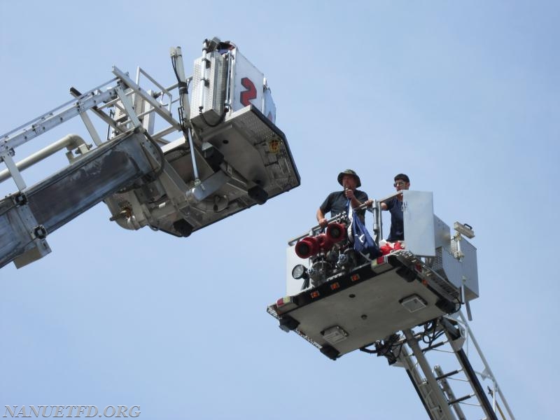 2015 BBQ Contest. Fairway in Nanuet. 
Photo By Vincent P. Tuzzolino Raising the Flag. 8 Tower and 24 Tower.